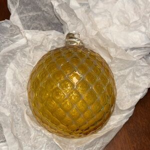Handblown glass Coradetti Glassworks globe ornament - yellow / champagne color